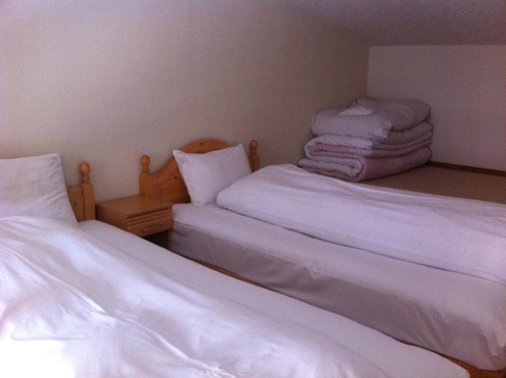 Pension New White Bear Kutchan Habitación foto